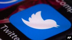 FILE - The Twitter app is seen on a smartphone in Philadelphia, Pennsylvania, April 26, 2017.