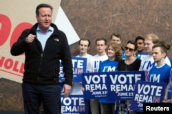 FILE - British Prime Minister David Cameron delivers a speech to supporters of the "Stronger In" campaign event in Witney, Oxfordshire, England, May 14, 2016.