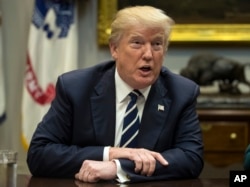 FILE - President Donald Trump speaks in the Roosevelt Room of the White House, Jan. 11, 2018. In a tweet on Jan. 6, he slammed reports questioning his mental stability and referred to himself as a "very stable genius."