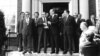 Soviet General Secretary Leonid Brezhnev shakes hands with U.S. President Ford after their first round of talks at the American Embassy in Helsinki, July 30, 1975. (AP Photo)