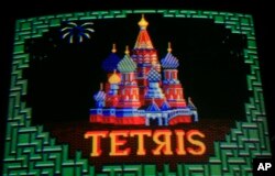 FILE - This May 22, 2009, photo, shows the video game Tetris at Barcade in Brooklyn, New York.