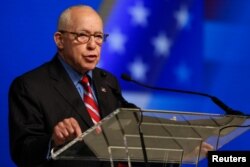 Michael Mukasey, former U.S. Attorney General, delivers a speech during the 2018 Iran Uprising Summit in New York, Sept. 22, 2018.