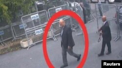 A still image taken from CCTV video and obtained by TRT World claims to show Saudi journalist Jamal Khashoggi, highlighted in a red circle by the source, as he arrives at Saudi Arabia's Consulate in Istanbul, Turkey, Oct. 2, 2018. 