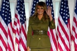 First lady Melania Trump arrives to speak on the second night of the Republican National Convention from the Rose Garden of the White House, Tuesday, Aug. 25, 2020, in Washington. (AP Photo/Evan Vucci)