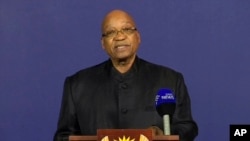 In this image from TV, President of South Africa Jacob Zuma announces the death of former South African President Nelson Mandela, to the media, Dec. 5, 2013, from a podium in Pretoria, South Africa.