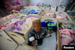 Children of Islamic State fighters who suffer from malnourishment are seen at a hospital in Hasaka, northeastern Syria, April 6, 2019.