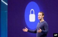 FILE- Facebook CEO Mark Zuckerberg delivers the keynote speech at F8, Facebook's developer conference, in San Jose, Calif., May 1, 2018.