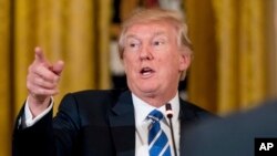 លោក​ប្រធានាធិបតី Donald Trump ថ្លែង​នៅ​ក្នុង​សេតវិមាន​ក្នុង​រដ្ឋធានី​វ៉ាស៊ីនតោន ក្នុង​កិច្ចប្រជុំ​មួយ​ អំពី​ច្បាប់​សុខភាព​ កាលពី​ថ្ងៃទី៧ ខែមីនា ឆ្នាំ២០១៧។