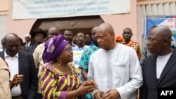 Le président de l'opposition Jean-Pierre Fabre, et la secrétaire-générale Brigitte Adjamagbo Johnson à Cotonou, le 25 août 2017.
