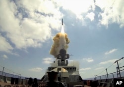 A Russian warship in the Mediterranean launches a long-range Kalibr cruise missile targeting Da'esh targets in Syria, August 19, 2016.