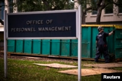 FILE - The Office of Personnel Management in Washington announced a massive data breach of the personal information of 21.5 million current and former U.S. federal workers in 2015.