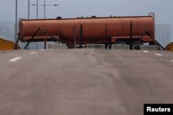 Fuel tank blocks the vehicular passage on Tienditas cross-border bridge between Colombia and Venezuela, in Cucuta, Colombia, Feb. 6, 2019.