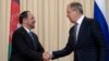 FILE - Russian Foreign Minister Sergey Lavrov, right, and his Afghan counterpart Salahuddin Rabbani shake hands after their meeting in Moscow, Russia, Feb. 7, 2017.