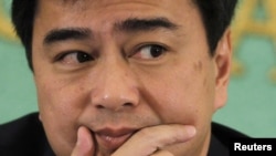 Former Thai Prime Minister Abhisit Vejjajiva attends a news conference at the Japan National Press Club in Tokyo, March 2, 2012.