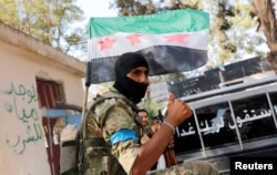 FILE - A member of Turkish-backed Free Syrian Army (FSA) is pictured in the border town of Jarablus, Syria, Aug. 31, 2016.