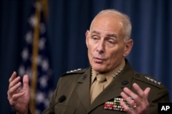 FILE - Gen. John Kelly speaks to reporters during a briefing at the Pentagon, Jan. 8, 2016.