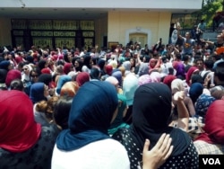 Protesters say even though officials were arrested, the Facebook page where exam questions and answers are leaked is still running, June 27, 2016. (H. Elrasam/VOA)