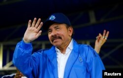 Nicaragua's President Daniel Ortega waves to supporters during celebrations to mark the 39th anniversary of the "Repliegue" (Withdrawal) in Managua, July 7, 2018.