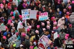 FILE - Protesters gather near the U.S. Capitol in Washington D.C. for the Women' March, Jan. 21, 2017. (Photo: B. Allen / VOA)