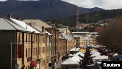 Shoppers explore the historic Salamanca Markets in Australia where a huge range of food, clothes and local crafts are on offer, August 27, 2011