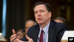 FBI Director James Comey testifies before the Senate Intelligence Committee hearing on Russian intelligence activities, on Capitol Hill in Washington, Jan. 10, 2017.