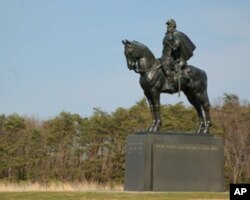 A monument to Confederate general Stonewall Jackson overlooks the battlefield at Manassas. Americans have honored the military leaders of the South as heroes, even though they led a rebellion against the U.S. government.