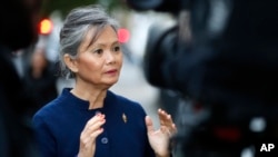 FILE PHOTO - Mu Sochua, deputy leader of the Cambodia National Rescue Party (CNRP), the Cambodian opposition, speaks during an interview with Associated Press in London, Thursday, Nov. 16, 2017. (AP Photo/Frank Augstein)