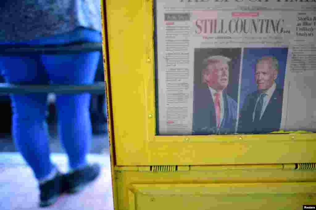 A newspaper's front headline states "Still Counting..." after Democratic presidential nominee Joe Biden overtook President Donald Trump in the Pennsylvania general election vote count, in Philadelphia, Pennsylvania, Nov. 6, 2020.