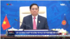 ນາຍຍົກລັດຖະມົນຕີຫວຽດນາມ ທ່ານ ຟາມ ມິນ ຈິນ ກ່າວຖະແຫລງຜ່ານທາງໄກ ຢູ່ທີ່ກອງປະຊຸມສຸດຍອດເອເຊຍຕາເວັນອອກ ເມື່ອວັນທີ 27 ຕຸລາ 2021. Photo VTV.