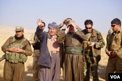 Kurdish notables including family members of Iraqi Kurdistan President Masoud Barzani watched the battle for Bashiqa unfold. (J. Dettmer/VOA)