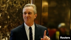 FILE - Robert F. Kennedy Jr. enters the lobby of Trump Tower in Manhattan, New York, Jan. 10, 2017.