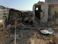 The headquarters of Kataeb Hezbollah, or Hezbollah Brigades militia, lies in ruins in the aftermath of a U.S. airstrike in Qaim, Iraq, Dec. 30, 2019.