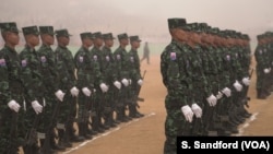 Karen National Liberation Army soldiers stand at attention during the Karen Revolution day ceremonies Jan. 31, 2019, in Karen state, Myanmar, near the Thai-Myanmar border.