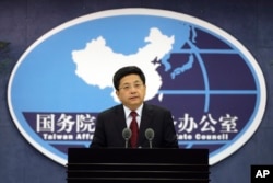 中国国务院台办发言人马晓光在国台办的记者会上（资料图）