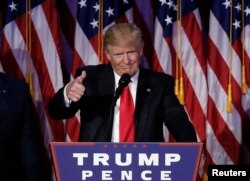 U.S. President-elect Donald Trump greets supporters during his election night rally in Manhattan, New York, U.S., Nov. 9, 2016.