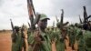 FILE - South Sudanese rebel soldiers raise their weapons at a military camp in the capital Juba, South Sudan, April 7, 2016. 