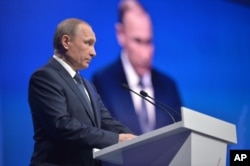 Russian President Vladimir Putin addresses a regional meeting of pro-Kremlin United Peoples' Front in Stavropol, on Monday, Jan. 25, 2016.