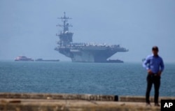 The USS Carl Vinson is anchored at Tien Sa Port in Danang, Vietnam, March 5, 2018.