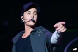 Recording artist Justin Bieber performs at the 2015 Billboard Hot 100 Music Festival at Nikon at Jones Beach Theater in Wantagh, New York.