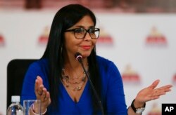 FILE - In this Aug. 28, 2017, photo, Delcy Rodriguez, then-president of the Constitutional Assembly, gives a press conference in Caracas.