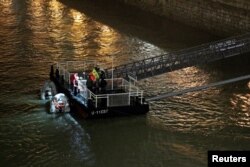 A rescue boat is seen on the Danube river after a tourist boat capsized in Budapest, Hungary, May 30, 2019.