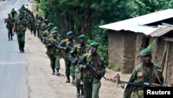 Wanajeshi wa Jamhuri ya kidemokrasia ya Congo wakipiga doria katika mji wa Rutshuru mashariki mwa DRC.