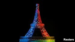 La tour Eiffel illuminée pour le lancement de la campagne internationale de Paris pour les JO 2024, à Paris, le 3 février 2017. (Photo d'archives)