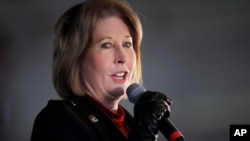 FILE - Attorney Sidney Powell, a member of President Donald Trump's legal team, speaks during a rally on Dec. 2, 2020, in Alpharetta, Ga.