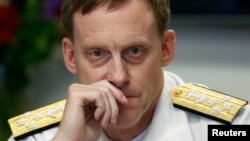 NSA Director Adm. Michael Rogers listens at a Reuters CyberSecurity Summit in Washington, May 12, 2014. 