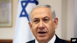 FILE - Israeli Prime Minister Benjamin Netanyahu chairs the weekly cabinet meeting in his office in Jerusalem.
