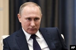 Russian President Vladimir Putin listens during a meeting in Moscow, Russia, Feb. 6, 2017.