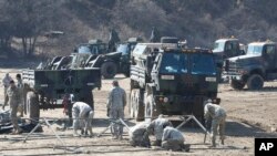 U.S. Army soldiers prepare for military exercises near the North Korea border in Paju, South Korea, March 6, 2017.