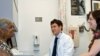 Edward Machtinger, director of the Women's HIV Program at UCSF, and clinical social worker Beth Chiarelli talk with patient Vicki Blake.