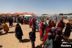 Women line up for relief at the Teachers' Village IDP camp in Maiduguri, Nigeria, Jan. 16, 2019.